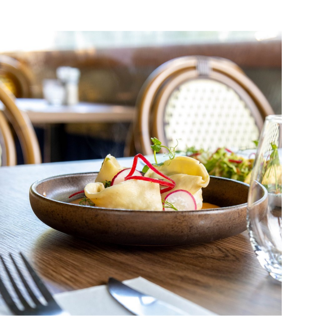 Enjoy local wines and bistro-style dishes at La Boheme Wine Bar, a charming escape near THREE43 ON B.