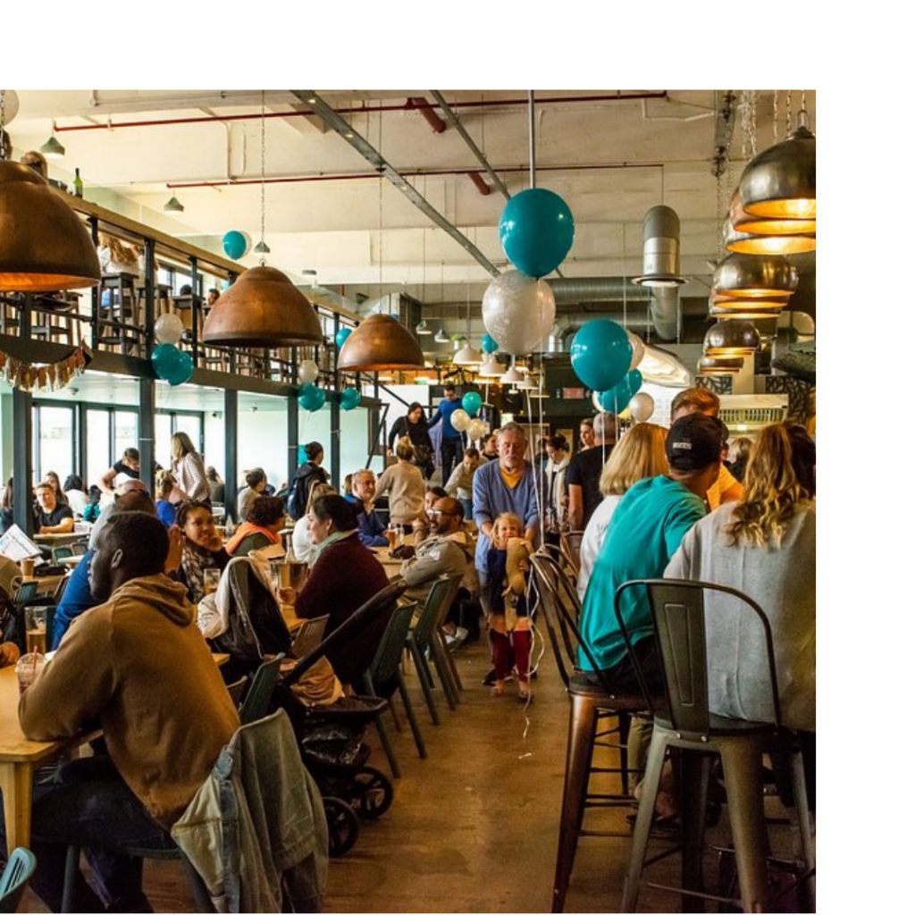Enjoy street food, live music, and artisan goods at Mojo Market near THREE43 ON B.