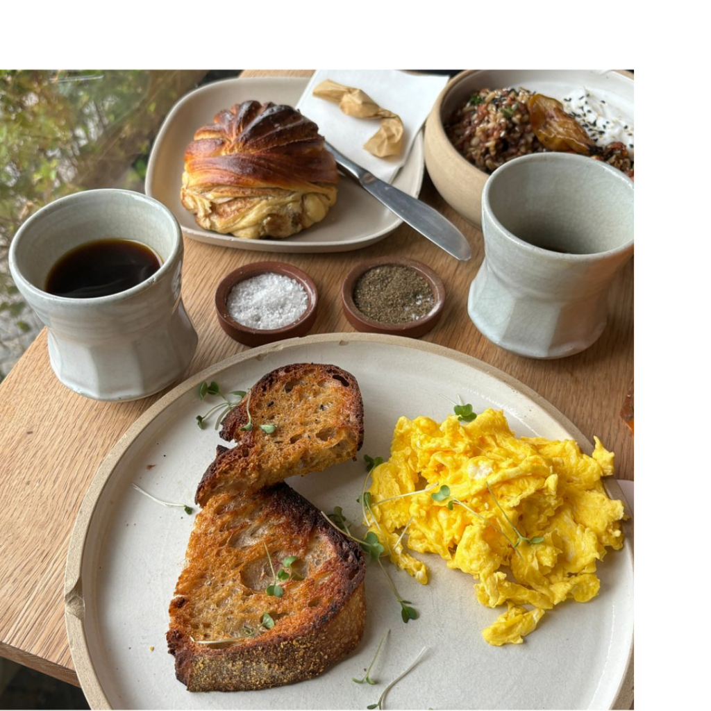 Enjoy great coffee, artisan snacks, and a vibrant atmosphere at Pauline’s, close to THREE43 ON B.