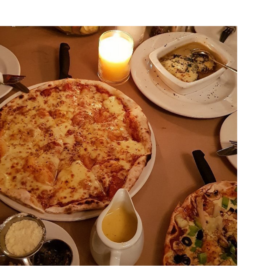 Savor large pizzas, fresh pasta, and Italian specialties at family-friendly Posticino near THREE43 ON B.