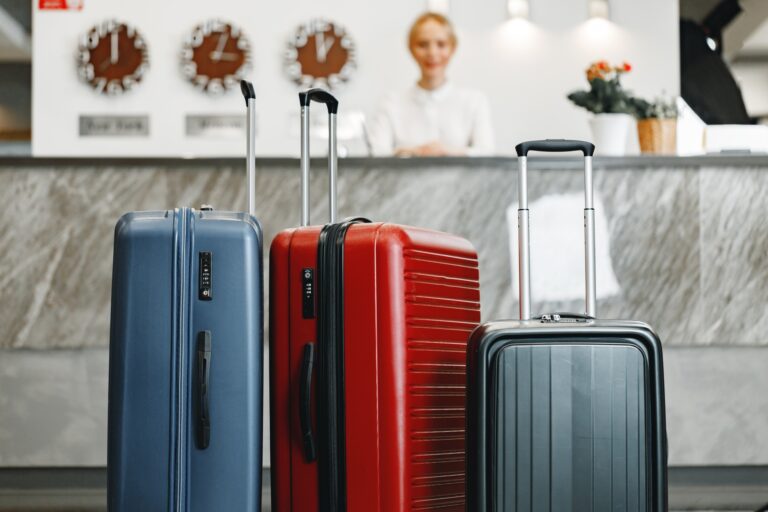 Luggage suitcase for trips standing in hotel lobby